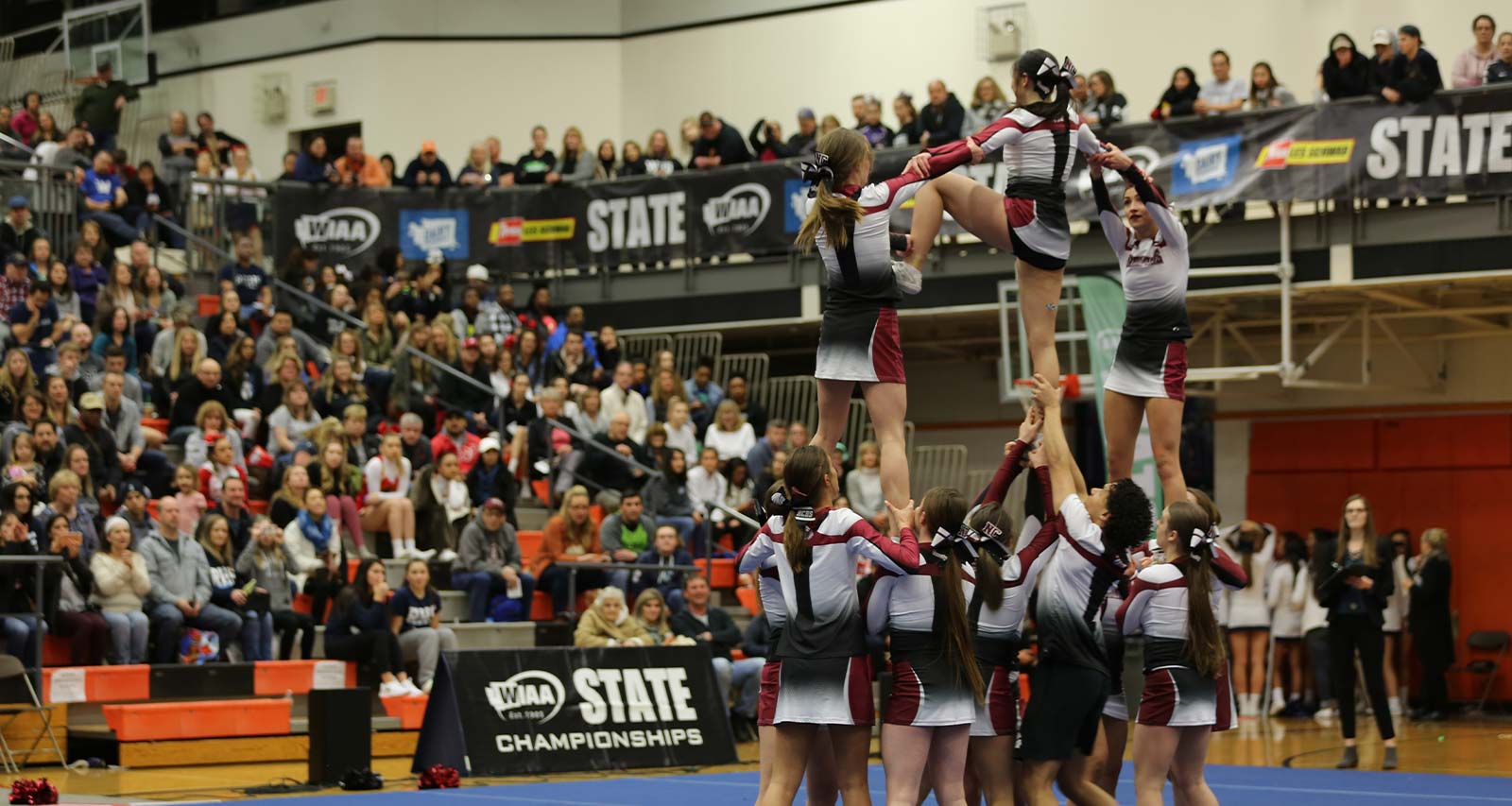 The cheer team wows the crowd at State Championships
